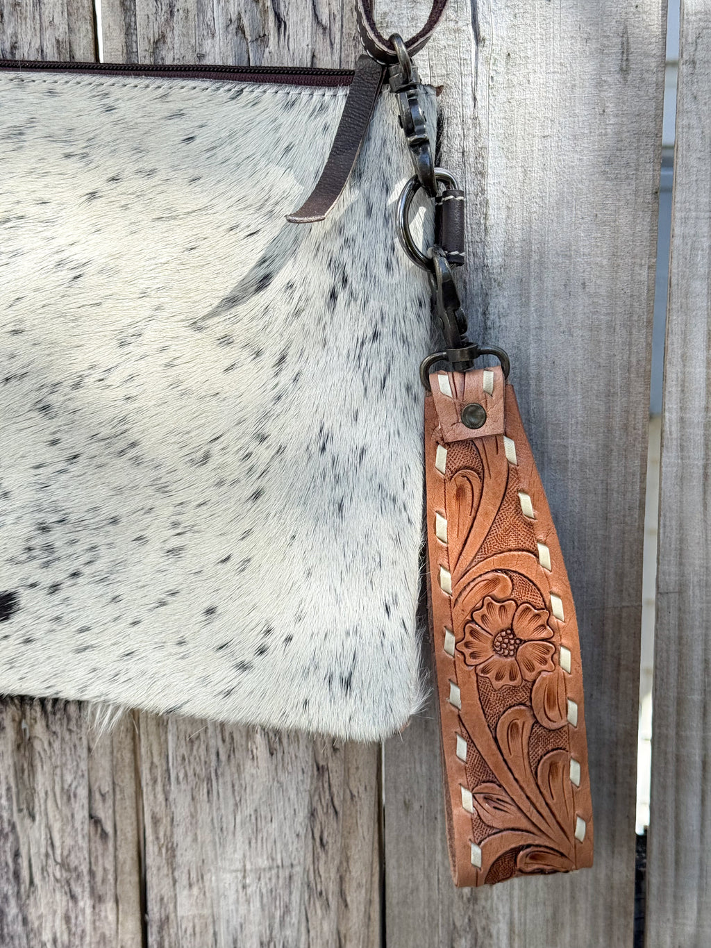 Lariat Luxe | Black and White Cowhide with Tooled Leather Design Handstrap and Removable Crossbody Strap