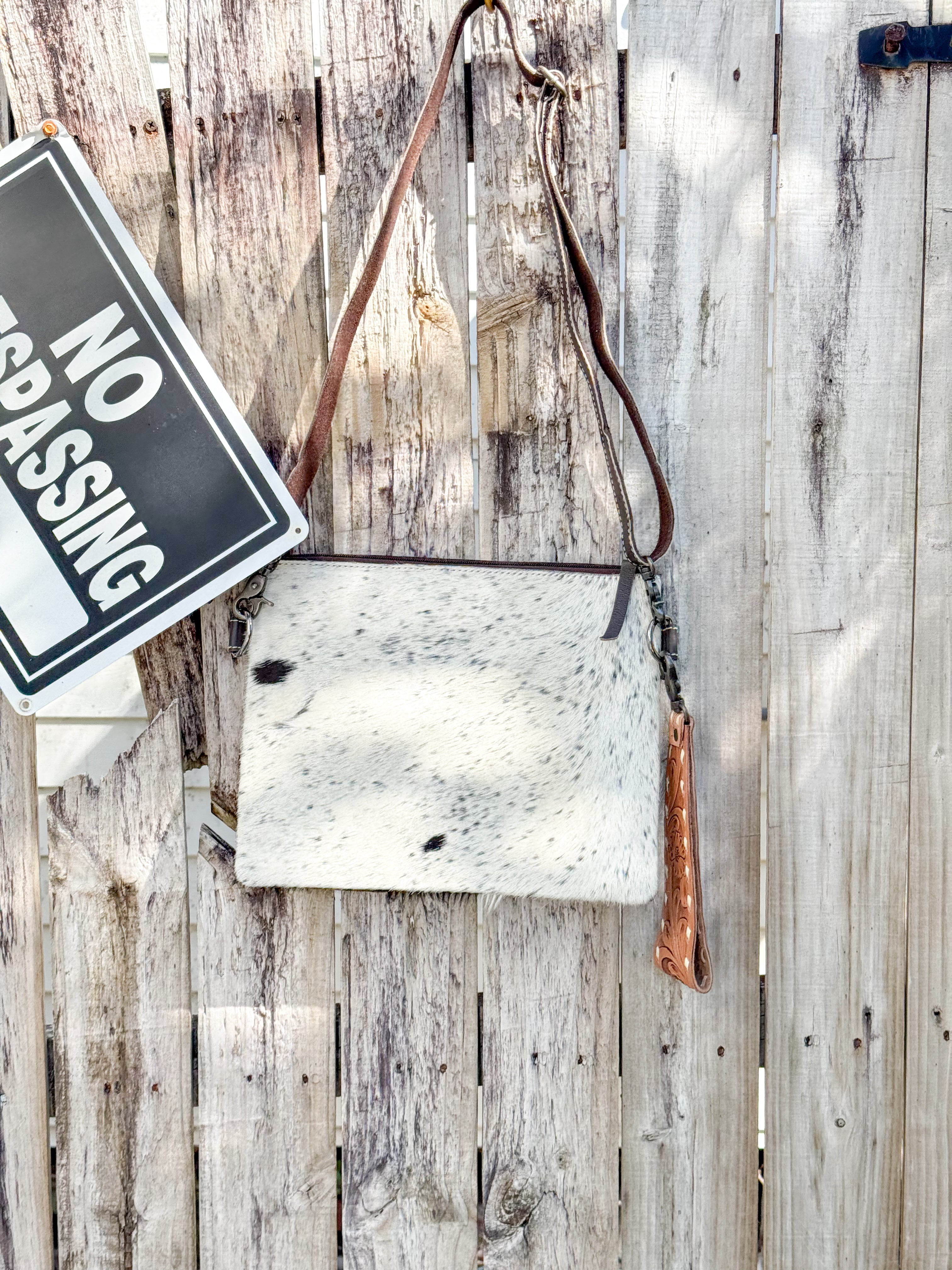 Lariat Luxe | Black and White Cowhide with Tooled Leather Design Handstrap and Removable Crossbody Strap